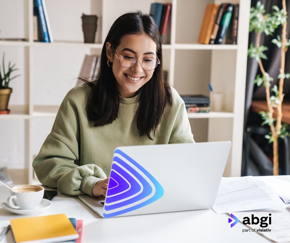Woman on laptop smiling